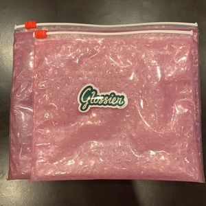 Glossier bags and sticker